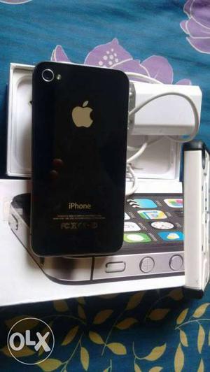 IPhone 4s With charger 2 covers for free 8 month