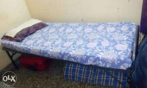 New iron cot with matress. Hardly used