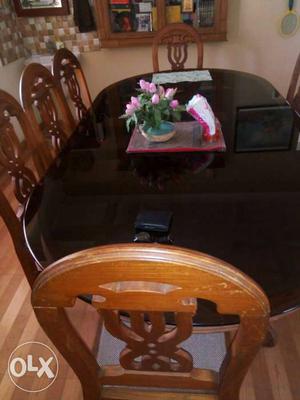 Oval Black And Brown Wooden Dining Set