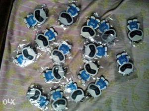 30 White And Blue Robot Keychains at 10 rs per piece