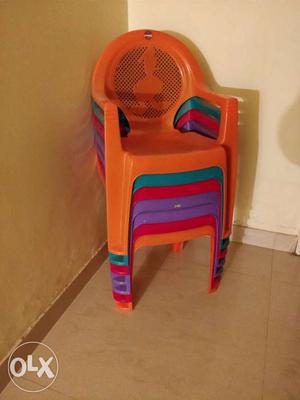 8 small colourful kids chairs