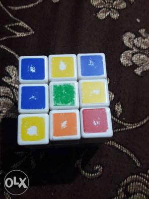 Blue, White, Yellow, Green And Red 3 By 3 Rubiks Cube