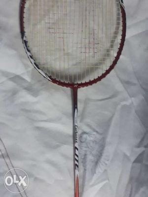 Brown And White Badminton Racket