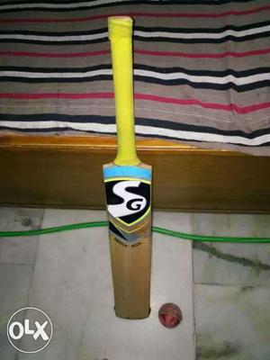 Good condition leather bat with leather ball