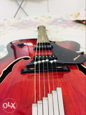 Red And Black String Guitar
