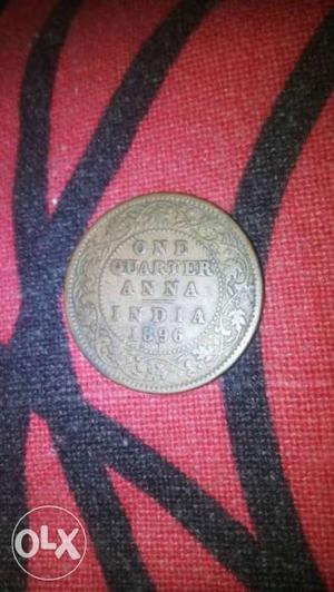 Round Silver-colored One Quarter Anna Indian Coin