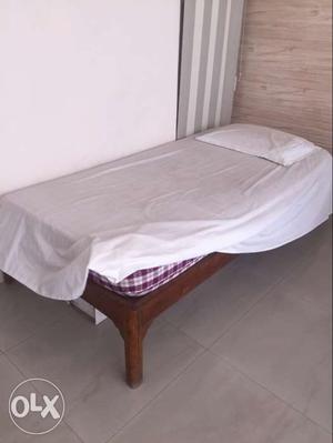 Sagwan wood bed with mattress cost 9k