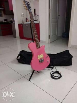 Unused first act electric Guitar with stand and