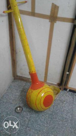 Yellow And Orange String Instrument