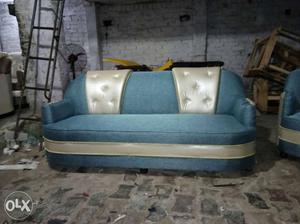 Blue And Gray Padded Sofa