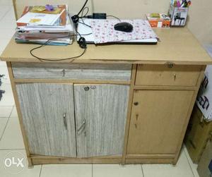 Brown And Gray Desk With Cabinets And Drawers