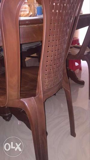 Brown Plastic Armless Chair