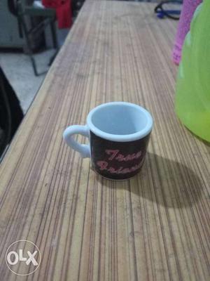 Dimention 2.5 cm black, White And Red Ceramic showpiece Mug