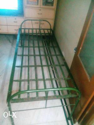 Metal green single bed for sale in good condation