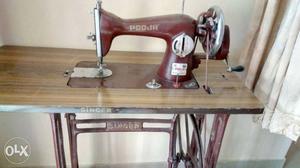 Red And Brown Treadle Sewing Machine