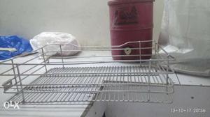 Steel storage baskets for retail shop. Units