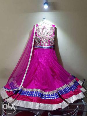 Ethnic gorgeous pink party wear suit with golden work