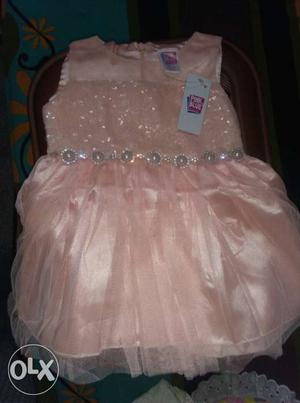Girl's Peach-colored Tulle Sleeveless Dress