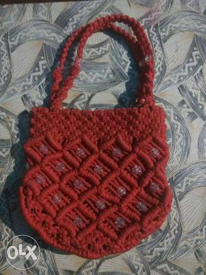Handmade micron thread bag...red in colour