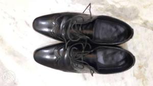 Men's Pair Of Black Leather Wingtip Shoes