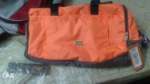 Orange And Black Duffle Bag