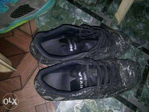Pair Of Black Nivia Sneakers