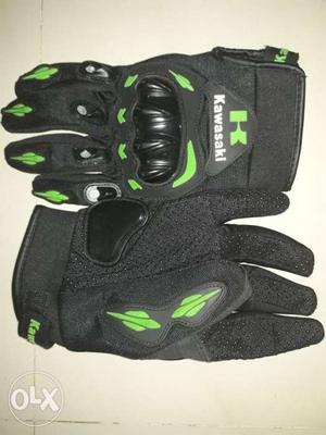 Pair Of Black-white-and-green Kawasaki Gloves