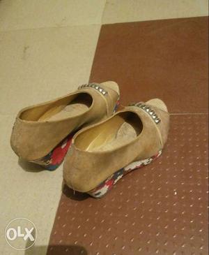 Pair Of Brown Leather Wedge Shoes