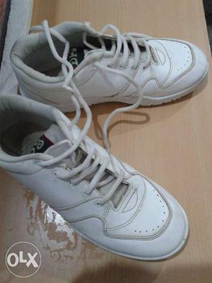 Pair Of White Sports Shoes