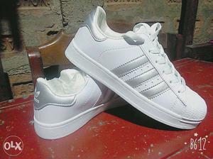 Pair Of White-and-gray Adidas Low Top Sneakers