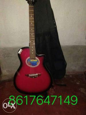Red And Black Single-cutaway Guitar With Case