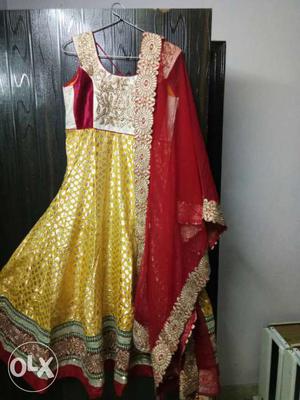 Red and yellow party wear floor length suit. 2