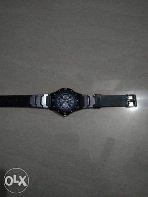 Round Black And Gray Chronograph Watch