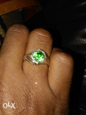 Round Emerald And Silver-colored Ring