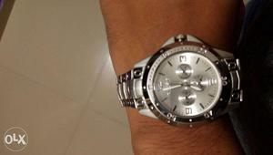 Round Silver Chronograph Watch With Silver-colored Link