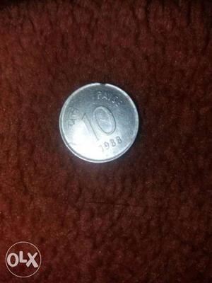 Round Silver-colored 10 Indian Paise Coin