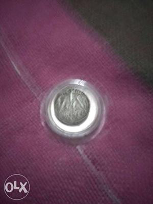 Round Silver-colored Rupee Coin