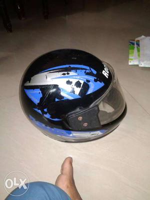 Black, White And Blue Full-faced Motorcycle Helmet