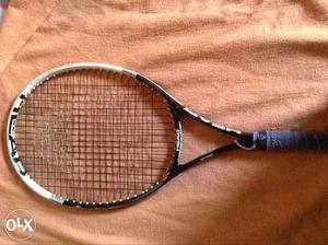 Branded company HEAD racket in good condition