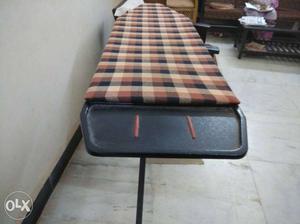 Foldable Ironing table. height adjustable.