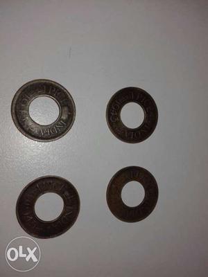 Four Round Brown Coins