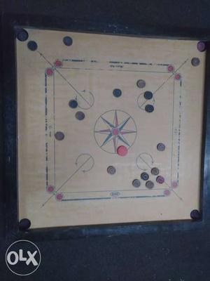 Full size carrom in good condition with coins. Urgently want