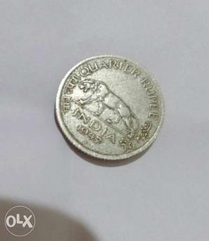 Quarter rupees coin .