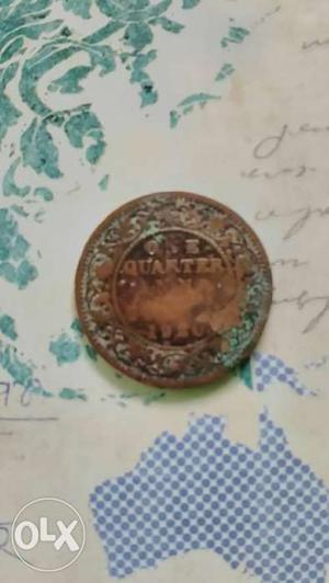 Round Copper-colored 1 Quarter Coin