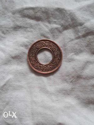 Round Gold-colored Holed Coin