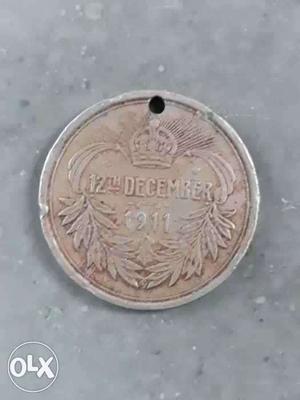Round Silver-colored 12th December  Coin