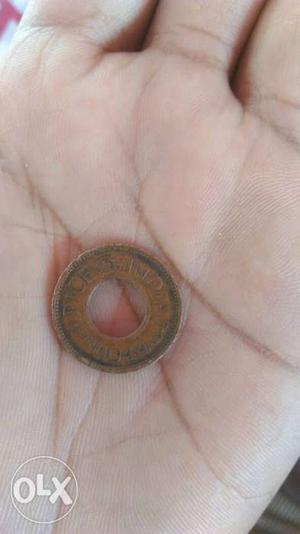 Round copper 1 paisa coin