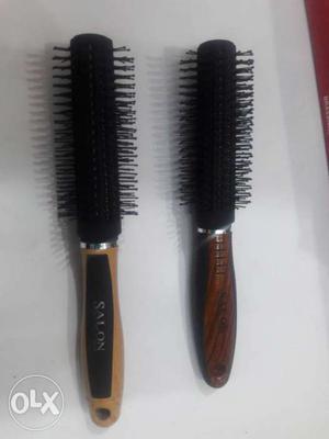Two Brown Wooden Handled Hair Brushes