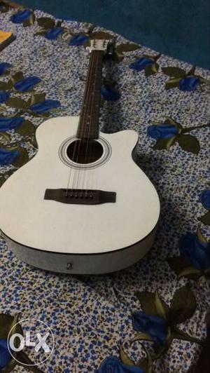 White Cut-out Acoustic Guitar
