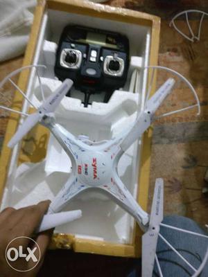 White Drone With Black RRC.. Syma X5c-1 Drone with camera